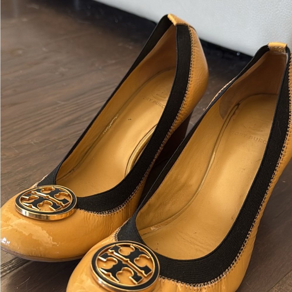 Tory Burch Yellow Heels with Gold Emblem and Black Accents